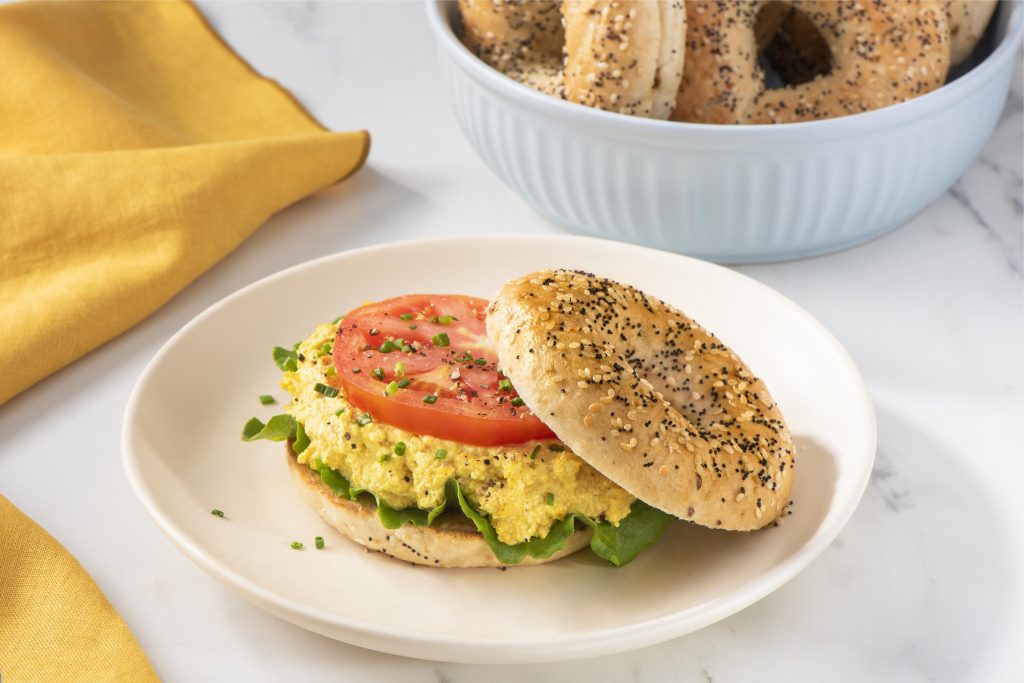 Tofu Egg(less) Bagelwich on toasted Country Harvest™ Everything Bagels